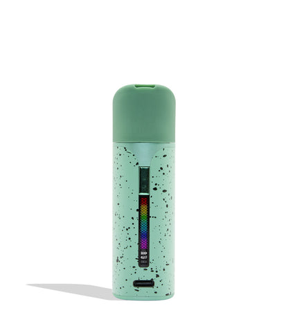 WULF MODS Pocket Mini portable concentrate vaporizer in teal/mint with black spatter pattern details, featuring a vertical rainbow LED indicator light on the side, shown against a plain white background. Front view